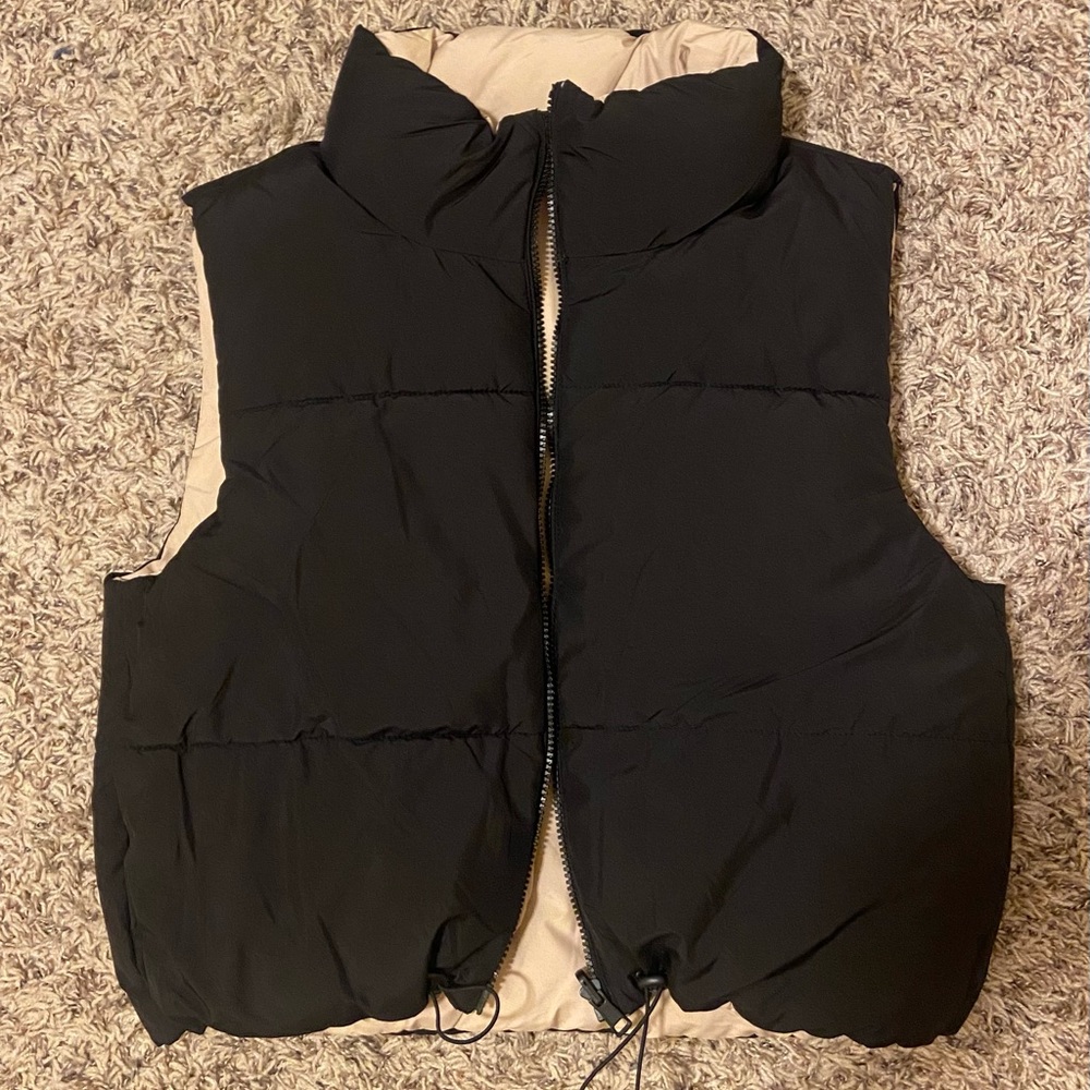 Reversible black puffer vest